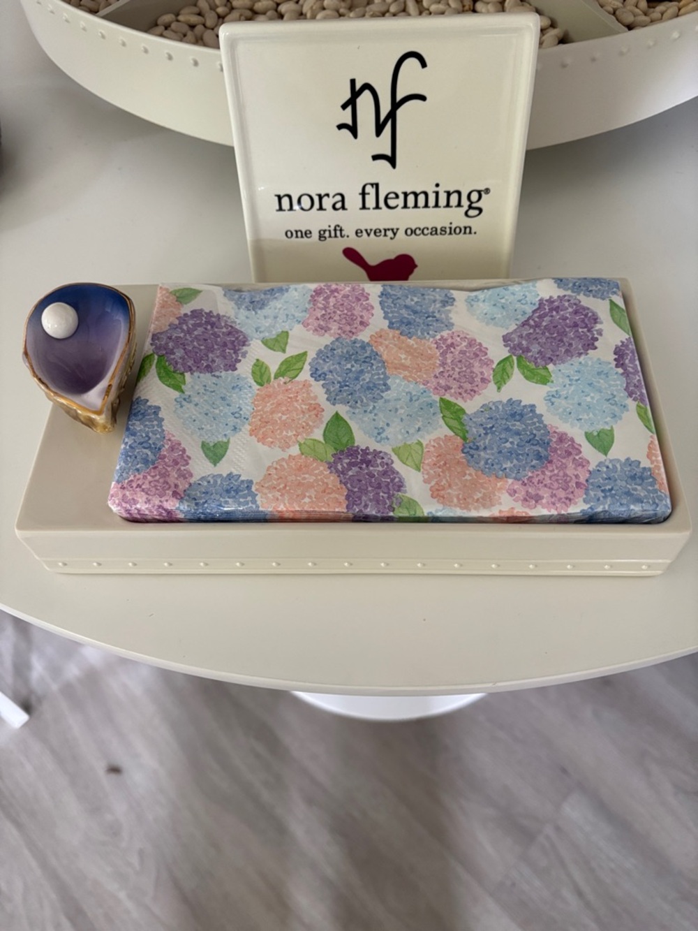 Nora Fleming retired pearl dots napkin holder 
With mini and napkins included.